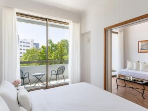 Premier Family Guestroom Side Sea View room in Grecotel Lux Me Dama Dama