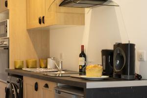Appartements Bel appartement neuf avec jardin : photos des chambres