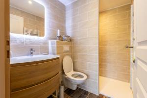Appartements Bel appartement neuf avec jardin : photos des chambres