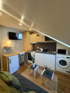 Appartements Studio pres des champs Elysee : photos des chambres