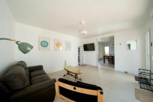 Maisons de vacances Maison avec jardin arbore et calme : photos des chambres