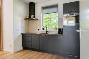 Bosvilla Lariks met sauna en hottub | 6 personen - Vakantiepark De Kremmer