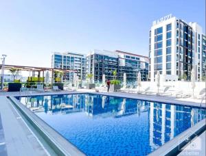 Chic Cozy Studio in Azizi Riviera Meydan - Msgetaways