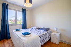 Appartements Maison avec jardin : photos des chambres