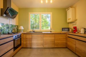 Appartements Maison avec jardin : photos des chambres