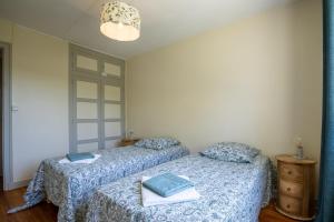 Appartements Maison avec jardin : photos des chambres