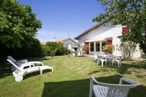 Appartements Maison avec jardin : photos des chambres