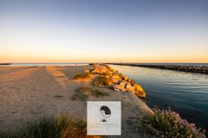 Appartements appartement 1ere ligne avec acces plage : photos des chambres