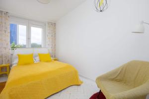 Colorful Two Bedroom Apartment Platynowa Warsaw Perfect for Remote Work by Noclegi Renters