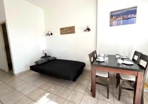 Appartements SAINT-FLORENT T2 avec terrasse piscine : photos des chambres