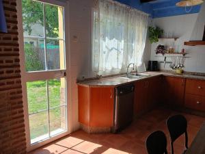 Casa con jardín con vistas al valle de Sierra de Líbar