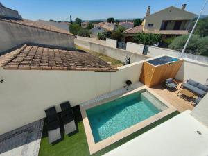 Villas Superbe Maison neuve Piscine Clim parking Recharge voiture electrique : photos des chambres