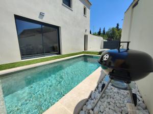 Villas Superbe Maison neuve Piscine Clim parking Recharge voiture electrique : photos des chambres
