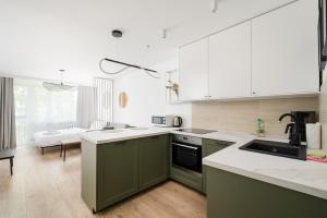 Broniewskiego Comfort Flow Apartment by Bookinghost