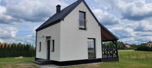 Domek nad jeziorem Potoczek, Giże