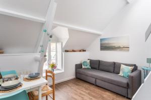 Appartements O ptit moulin- Studio vue sur le port : photos des chambres