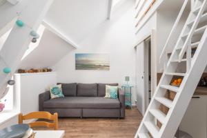 Appartements O ptit moulin- Studio vue sur le port : photos des chambres