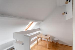 Appartements O ptit moulin- Studio vue sur le port : photos des chambres