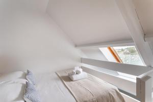 Appartements O ptit moulin- Studio vue sur le port : photos des chambres