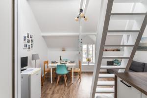 Appartements O ptit moulin- Studio vue sur le port : photos des chambres