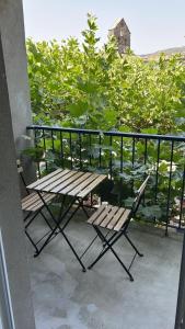 Appartement en cœur de village au pied du château avec 2 balcons