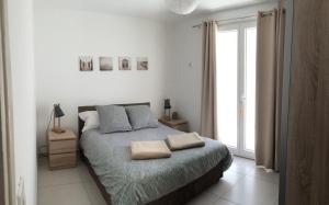 Appartements La Maison Blanche : photos des chambres