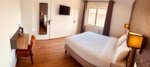 Hotels Le Coq Hardi : photos des chambres