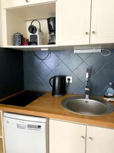 Appartements L oree du sable studio avec place de parking au coeur du triangle d Or : photos des chambres