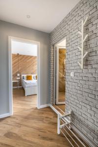 Апартамент с люлка и гледка в The House с Термална зона