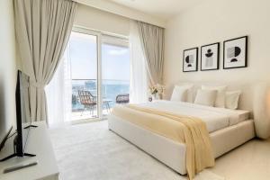 2BD designed by Elie Saab with Private Beach Sea View by EE Holiday Homes