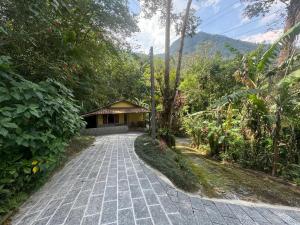 Sítio Pajuçara - Chalé 4 - Dentro do Parque Nacional da Serra dos Órgãos - Acesso ao açúde e cachoeira dentro da propriedade - 3hvězdičkové hotely ve městě Guapimirim