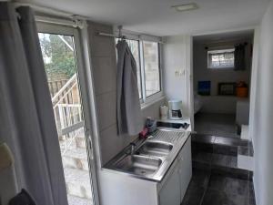 Appartements Apartment with garden and pool : photos des chambres
