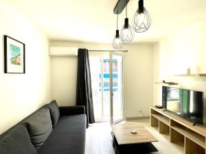 Appartements T2 Bleu Mer - Centre ville , Climatise , 5 min de la plage et a 250m de la gare : photos des chambres