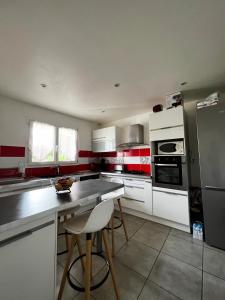 Villas Maison spacieuse avec spa gonflable : photos des chambres