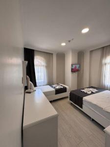 Standard Triple Room room in Hotel Oğuzhan