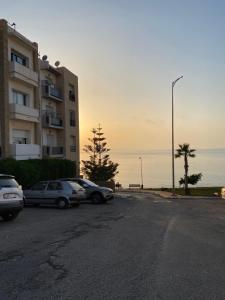 Facing the sea, close to the Corniche