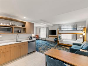 Family King Suite with Bunk Bed and Sofa Bed room in Hampton Inn by Hilton St Ignace Lakefront Mackinac