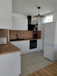 Evasion chic au coeur de la ville et proche plage - Garage privé - Deux chambres