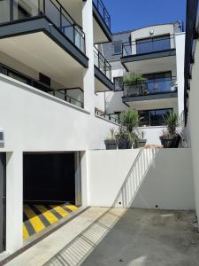 Appartements Evasion chic au coeur de la ville et proche plage - Garage prive - Deux chambres : photos des chambres