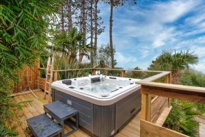 Maisons de vacances Bois Corail Maison de vacances jardin, vue mer & Spa : photos des chambres