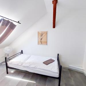 Útulný podkrovní pokoj R4 v Praze