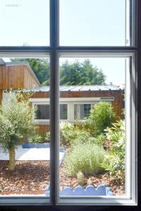 Appart'hotels Le Capitaine - LeParticulier Collection : Chambre Double - Vue sur Jardin
