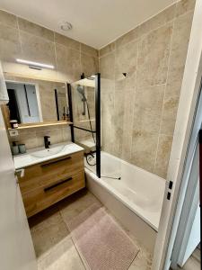 Appartements T2 design centre Aucamville - Clim-Parking : photos des chambres