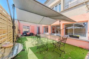 Appartements L-Hospice, T3 avec terrasse, 10min de la gare : photos des chambres