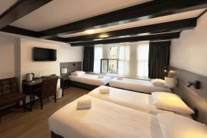 Quadruple Room with Private Bathroom room in Hotel de Munck