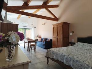 Appartements Au Coeur du Pays des Sorgues : photos des chambres