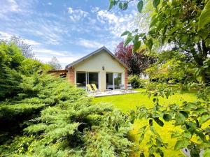 Nature luxuriante, jeux en famille, workation et Sauna pour 1 à 4 personnes