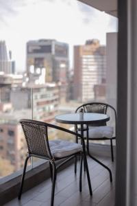 Cozy apartment steps away from Costanera Center