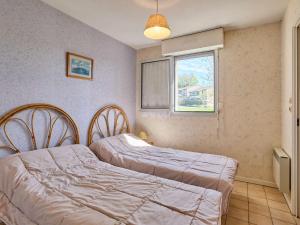 Appartements T2 Confort Proche Thermes avec Wifi Gratuit - FR-1-841-56 : photos des chambres