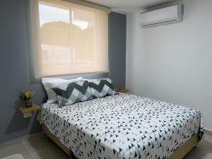 Comodo 2 cuartos AC y piscina